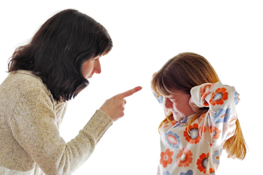 Mother telling off a child pointing finger