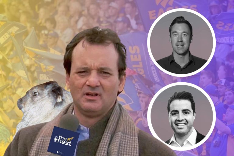 Bill Murray in GroundHog day holding a microphone with drew joes and Daniel Garb pictured as well