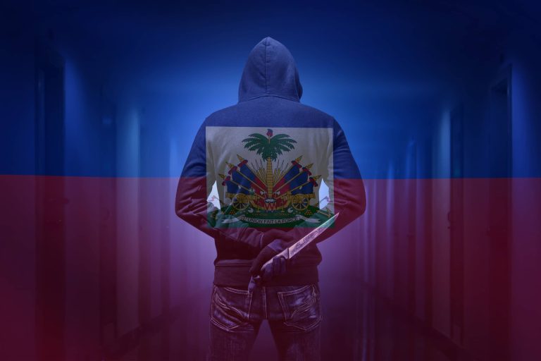 Haiti flag with a gang member holding a knife coming through