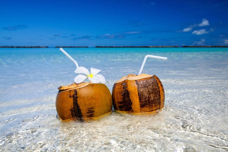 Coconuts looking romantic in tropical waters