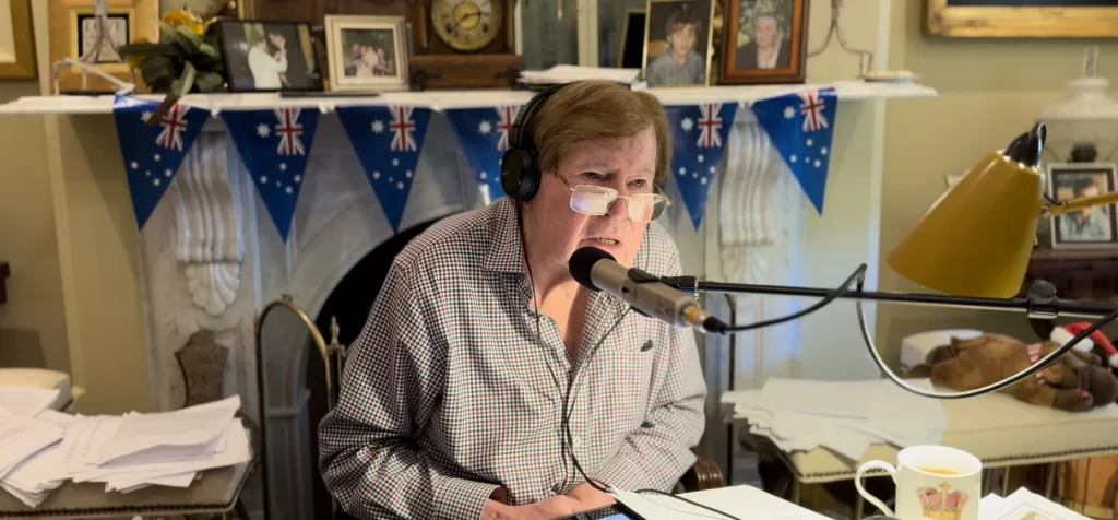 Jeremy Cordeaux sitting at the dining room table looking stern