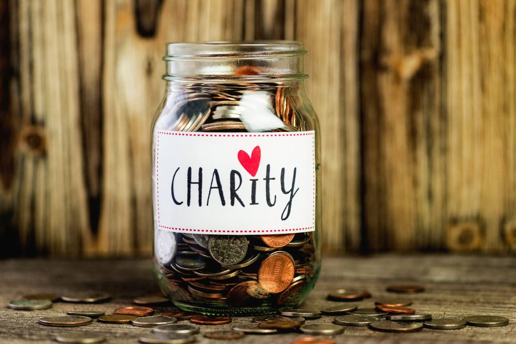 A charity jar full of coins