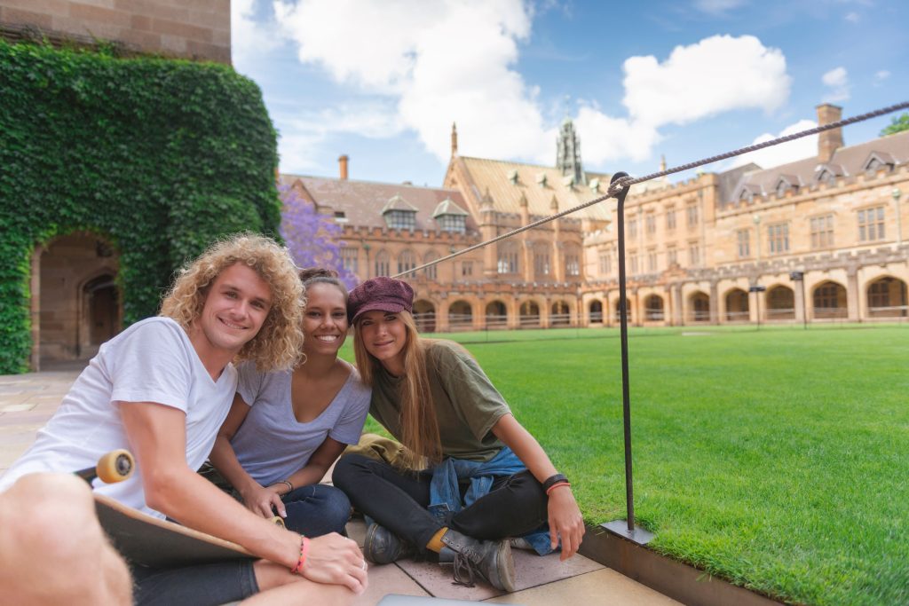 University Students sitting down at together. Jeremy Cordeaux talks about Education and is it worth the money?