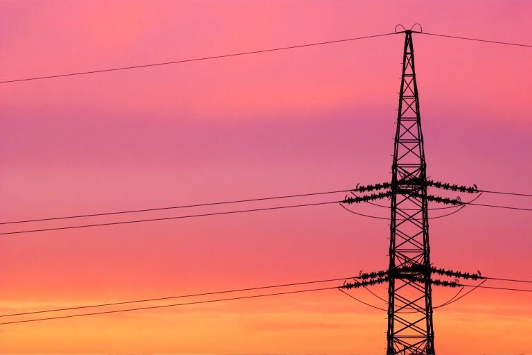 Energy lines with red and orange sky behind